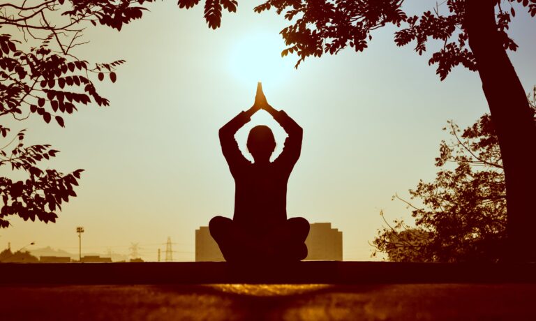 peaceful, yoga pose in the sunrise